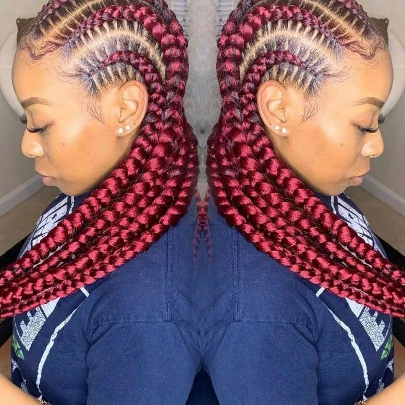 Kim's Hair Boutique client wearing large feed-in cornrows