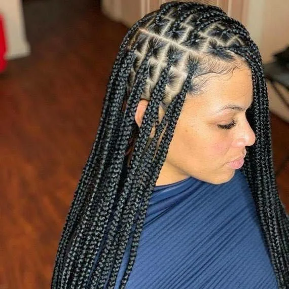 Kim's Hair Boutique client wearing medium knotless braids