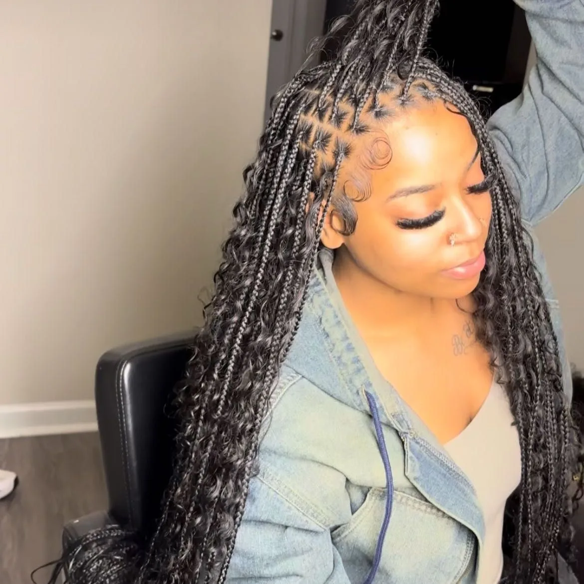 Kim's Hair Boutique client wearing small boho knotless braids