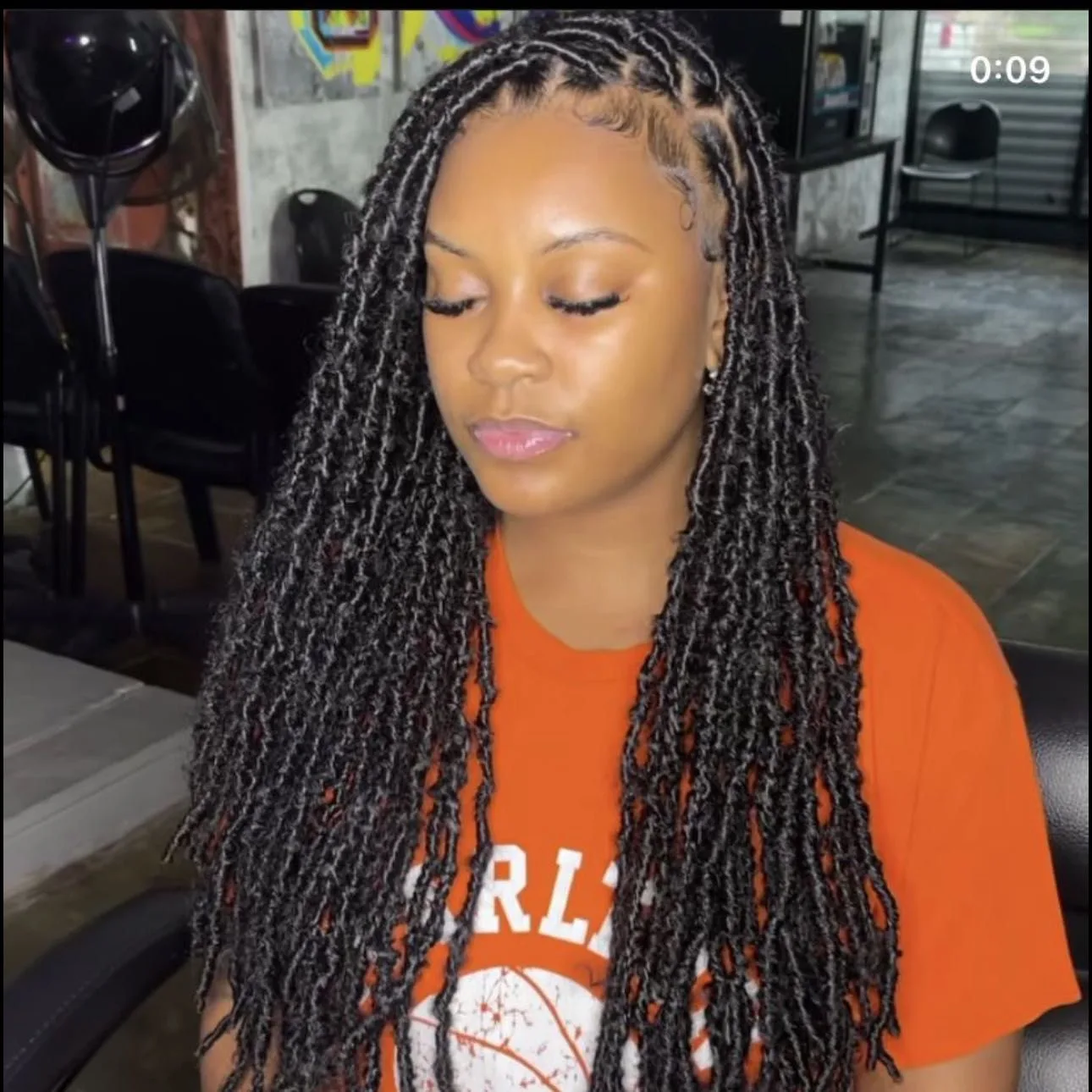 Kim's Hair Boutique client wearing soft locs